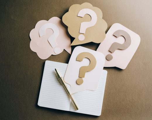 question marks on craft paper